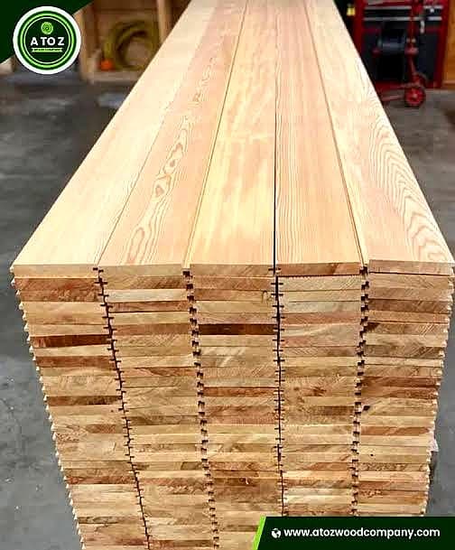 Treated wood planks for outdoor use and construction